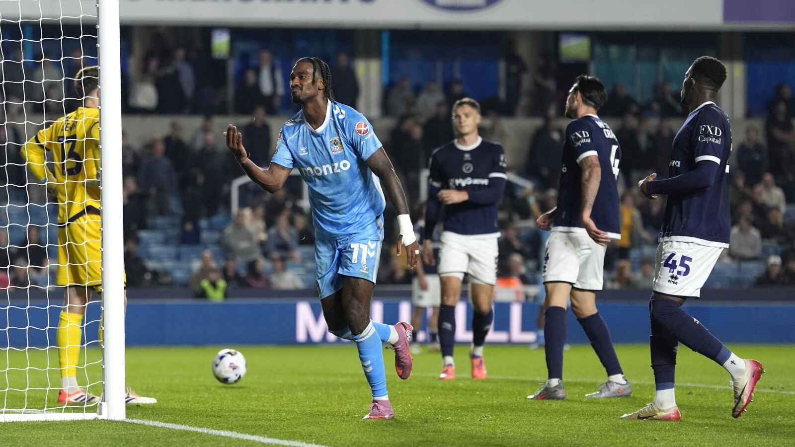 Haji Wright celebrates
