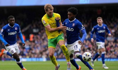 Norwich City’s Jack Stacey (left) and Ipswich Town’s Jaden Philogene battle for the ball