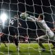 Oxford goalkeeper Jamie Cumming fails to stop Wrexham’s Nathan Broadhead (left) from scoring
