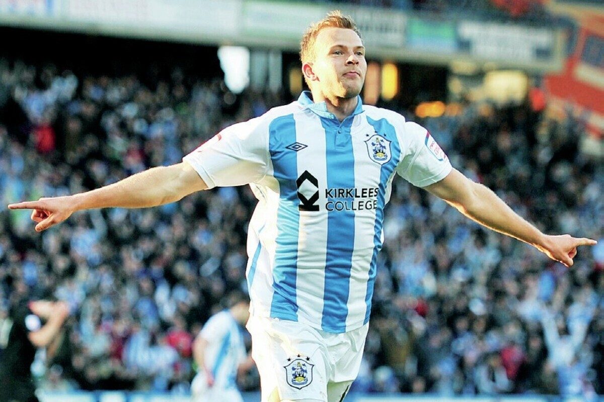 Jordan Rhodes celebrates another goal for Huddersfield Town