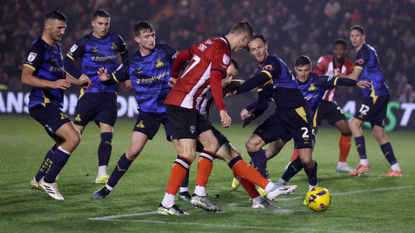 Lincoln City’s Ben House takes the shot that led to their winner