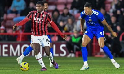 Walsall’s Daniel Kanu is tracked by Bromley’s Omar Sowunmi