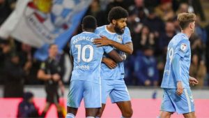 Ellis Simms celebrates his second goal of the afternoon for Coventry City