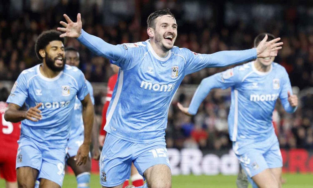 Coventry City's Liam Kitching (centre) celebrates
