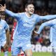 Coventry City's Liam Kitching (centre) celebrates