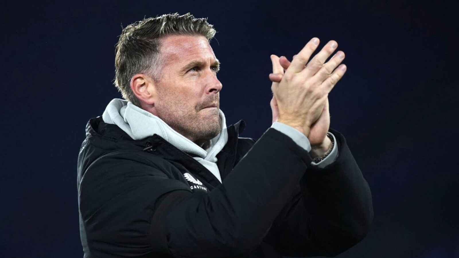 Middlesbrough manager Rob Edwards applauds the fans after the midweek draw at Leicester City