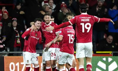 Nathan Broadhead (left) celebrates his goal for Wrexham