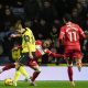 Oxford United’s Stan Mills battles for the ball with Middlesbrough’s Sontje Hansen