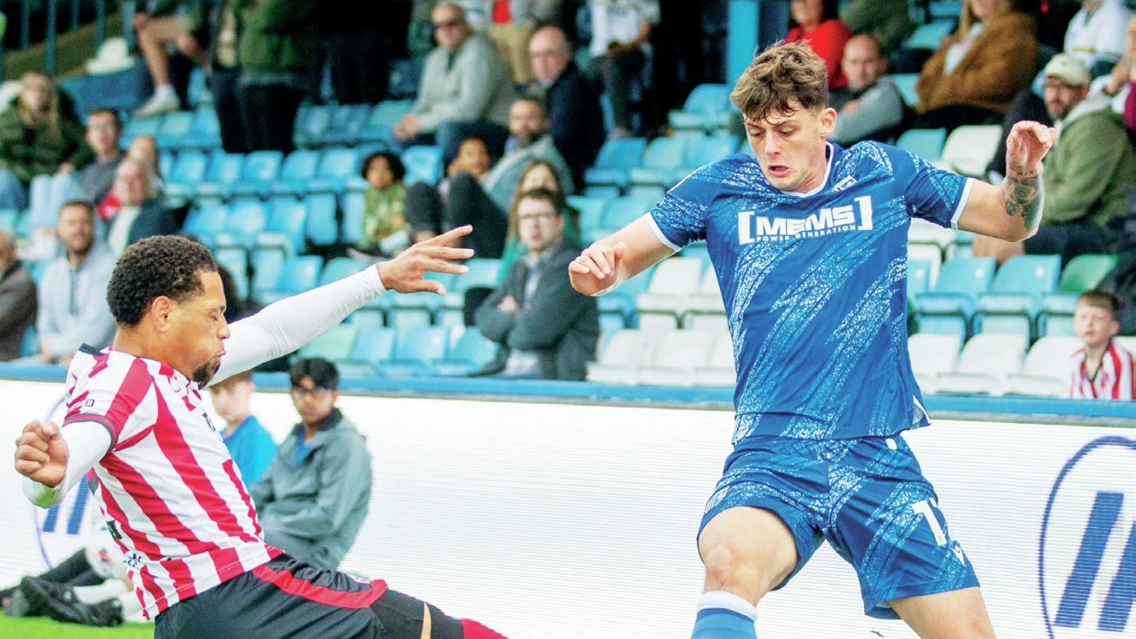 Seb Palmer-Houlden, right, was attracted to Gillingham by his manager’s enthusiasm