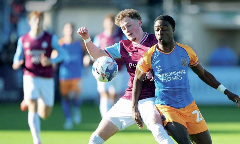 Shrewsbury Town’s Ismeal Kabia, right, battles for the ball in the FA Cup win at South Shields