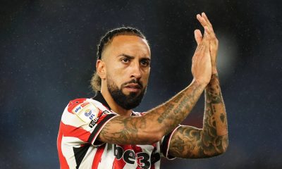 Sorba Thomas applauds