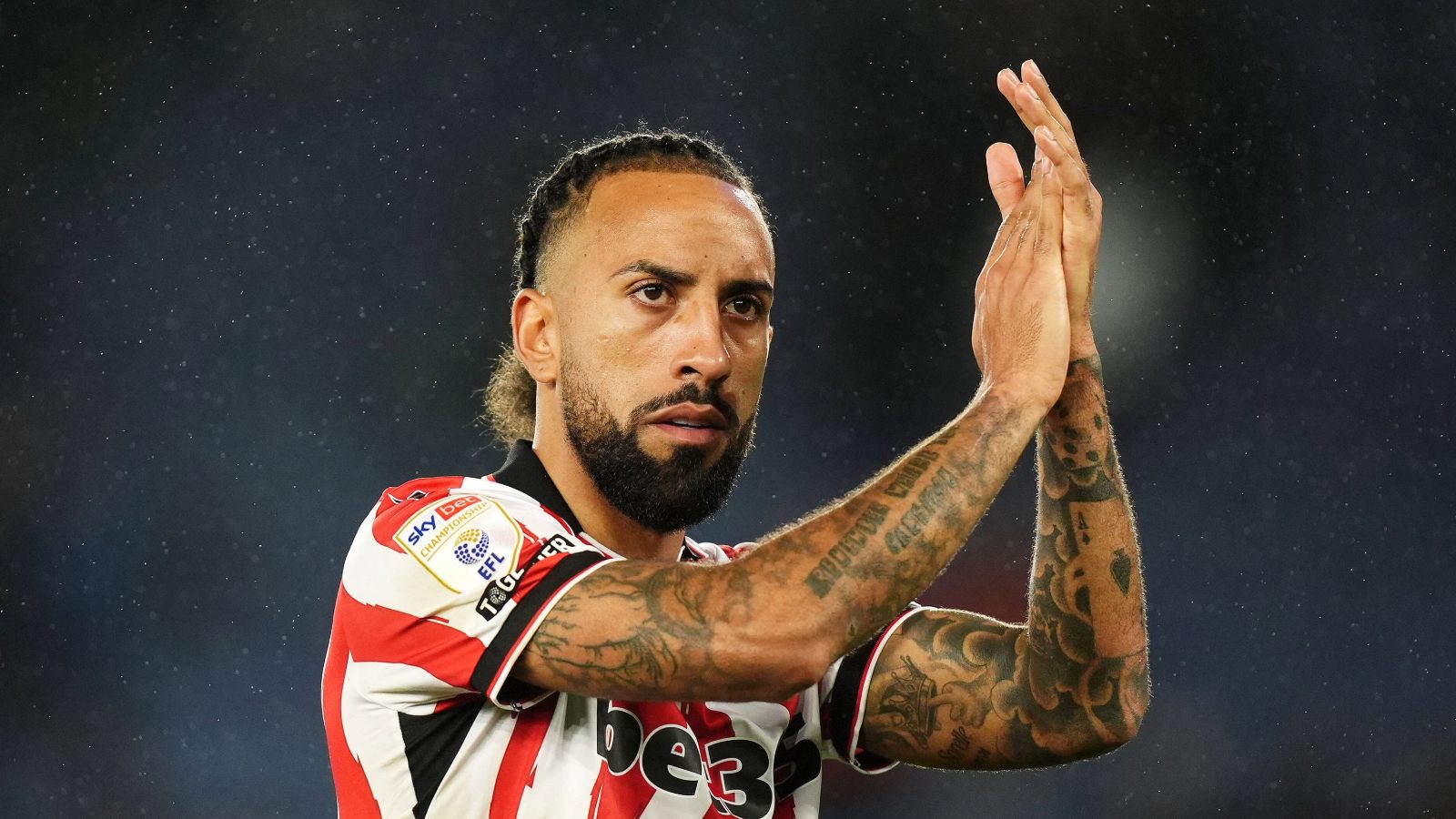 Sorba Thomas applauds