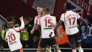 Taylor Harwood-Bellis (second left) celebrates with his Southampton team-mates