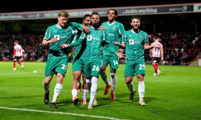 Notts County's Tyrese Hall (centre) celebrates with team-mates