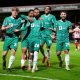 Notts County's Tyrese Hall (centre) celebrates with team-mates