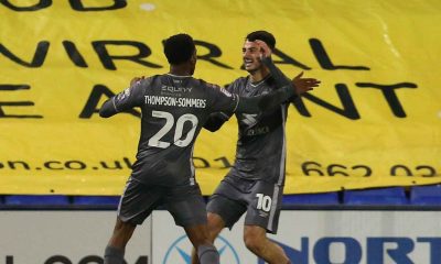 Aaron Collins, right, has set his sights high at MK Dons