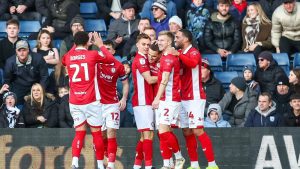 Anis Mehmeti wheels away after firing Bristol City ahead inside four minutes.
