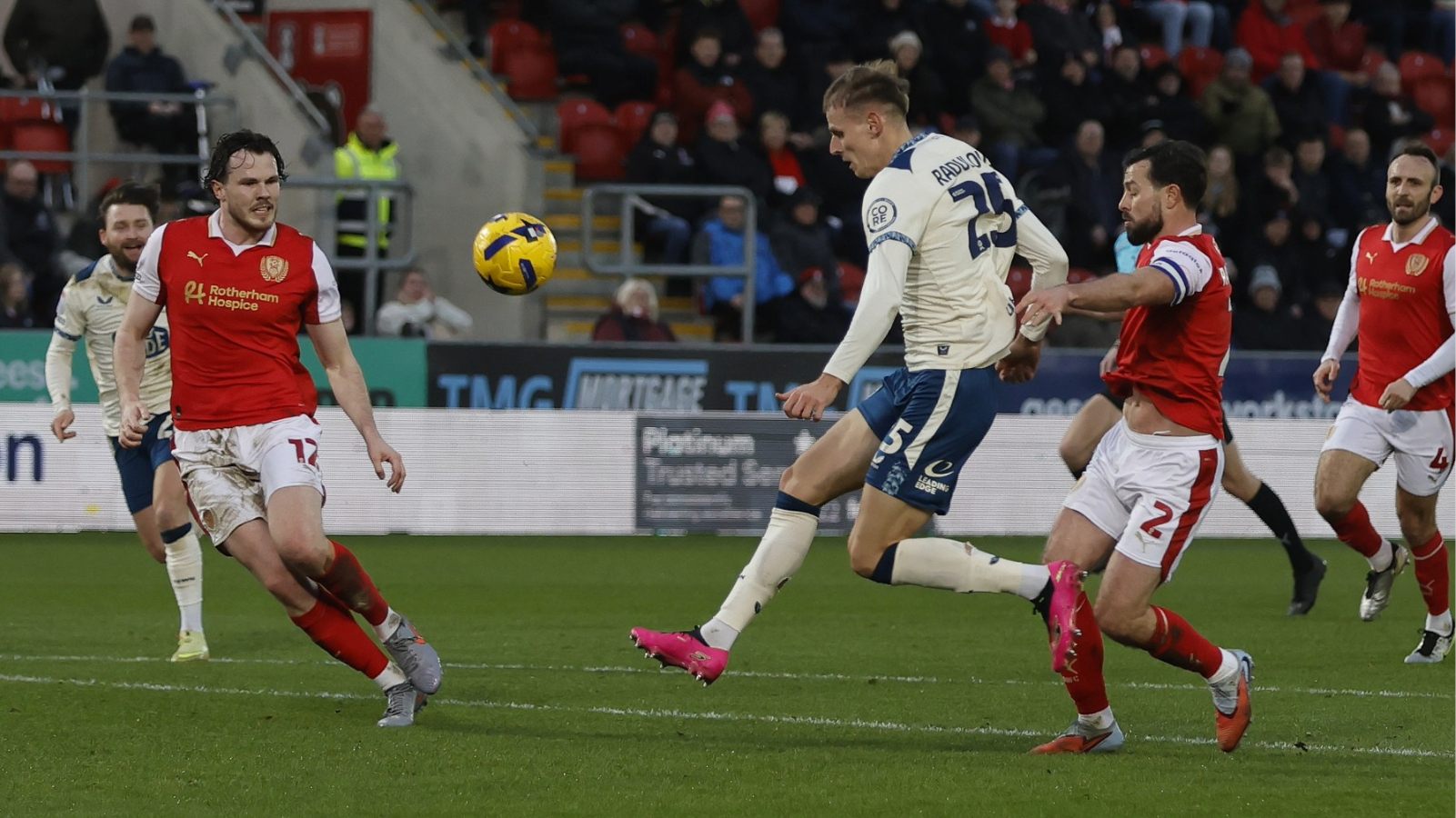 Bojan Radulovic lofts the ball into the net to put Huddersfield Town two up