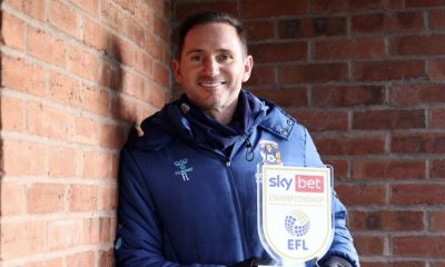 Coventry City boss Frank Lampard shows off his prize