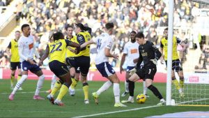 Preston North End’s Jordan Storey scores their opening goal
