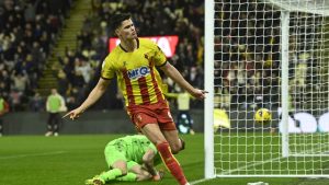 Luca Kjerrumgaard wheels away after scoring Watford’s winner
