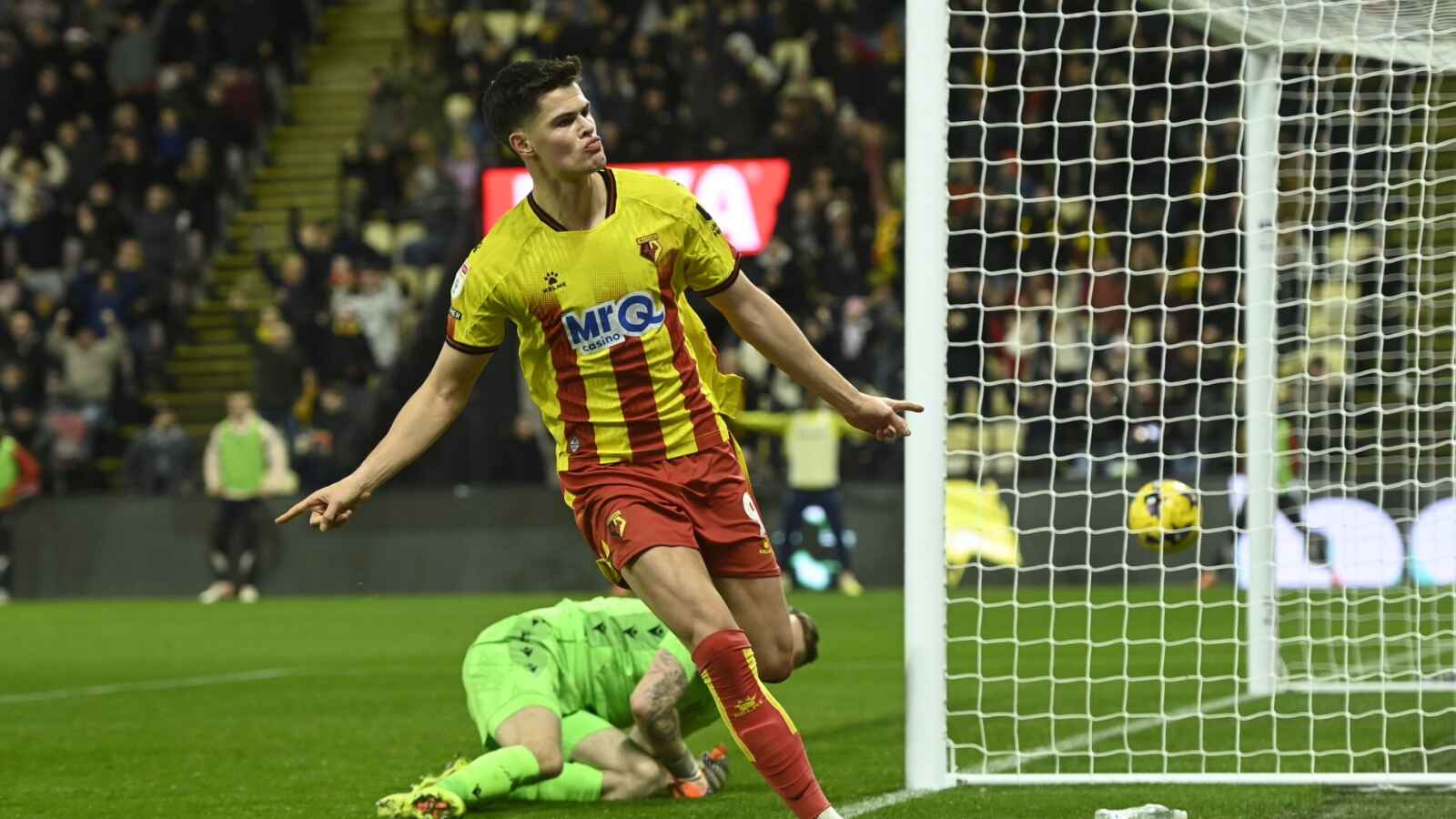 Luca Kjerrumgaard wheels away after scoring Watford’s winner