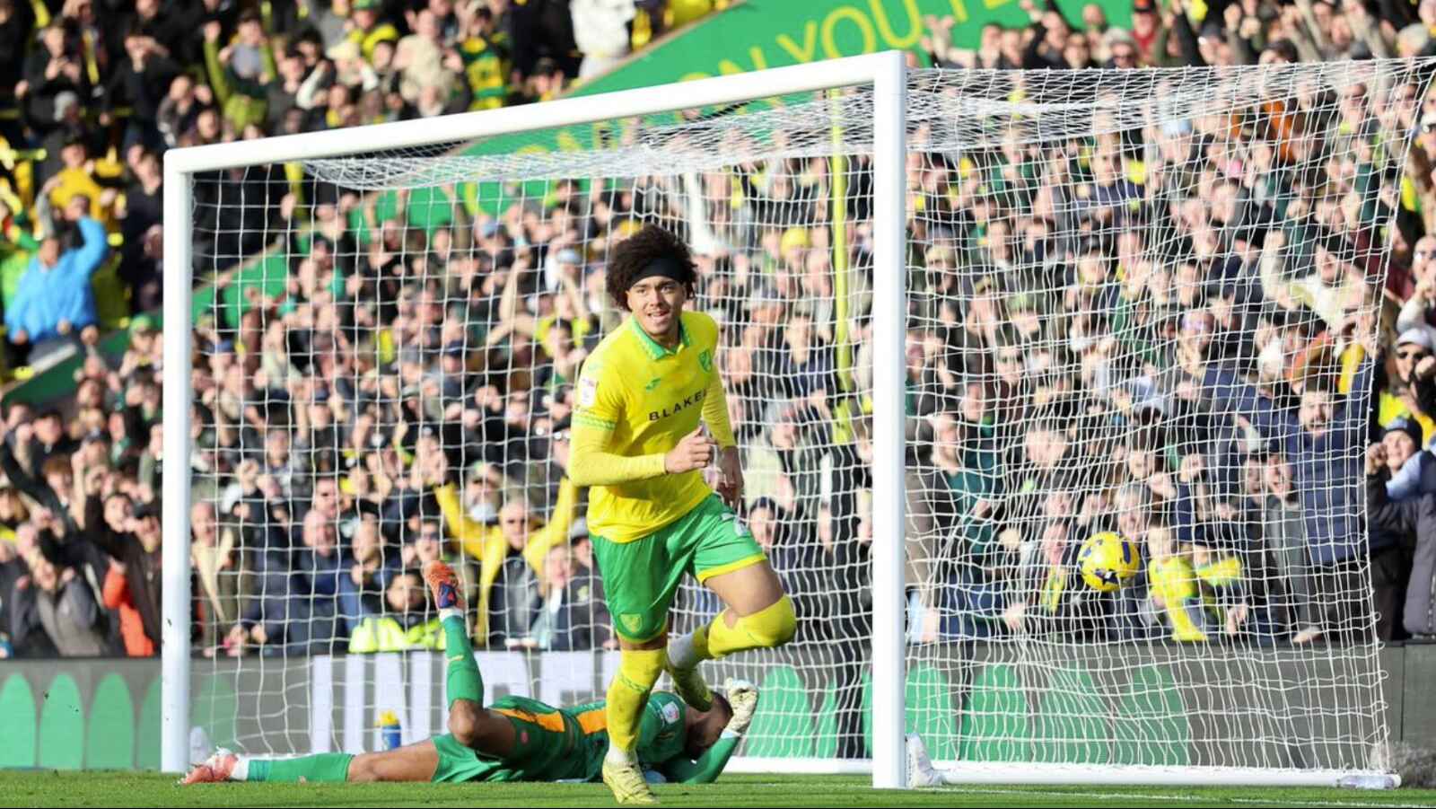 Norwich City’s Jovon Makama wheels away after scoring his first goal