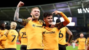 Oli McBurnie (left) scored as Hull City beat Wrexham