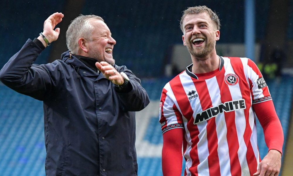 Patrick Bamford and Chris Wilder celebrate Sheffield United’s Steel City derby day victory