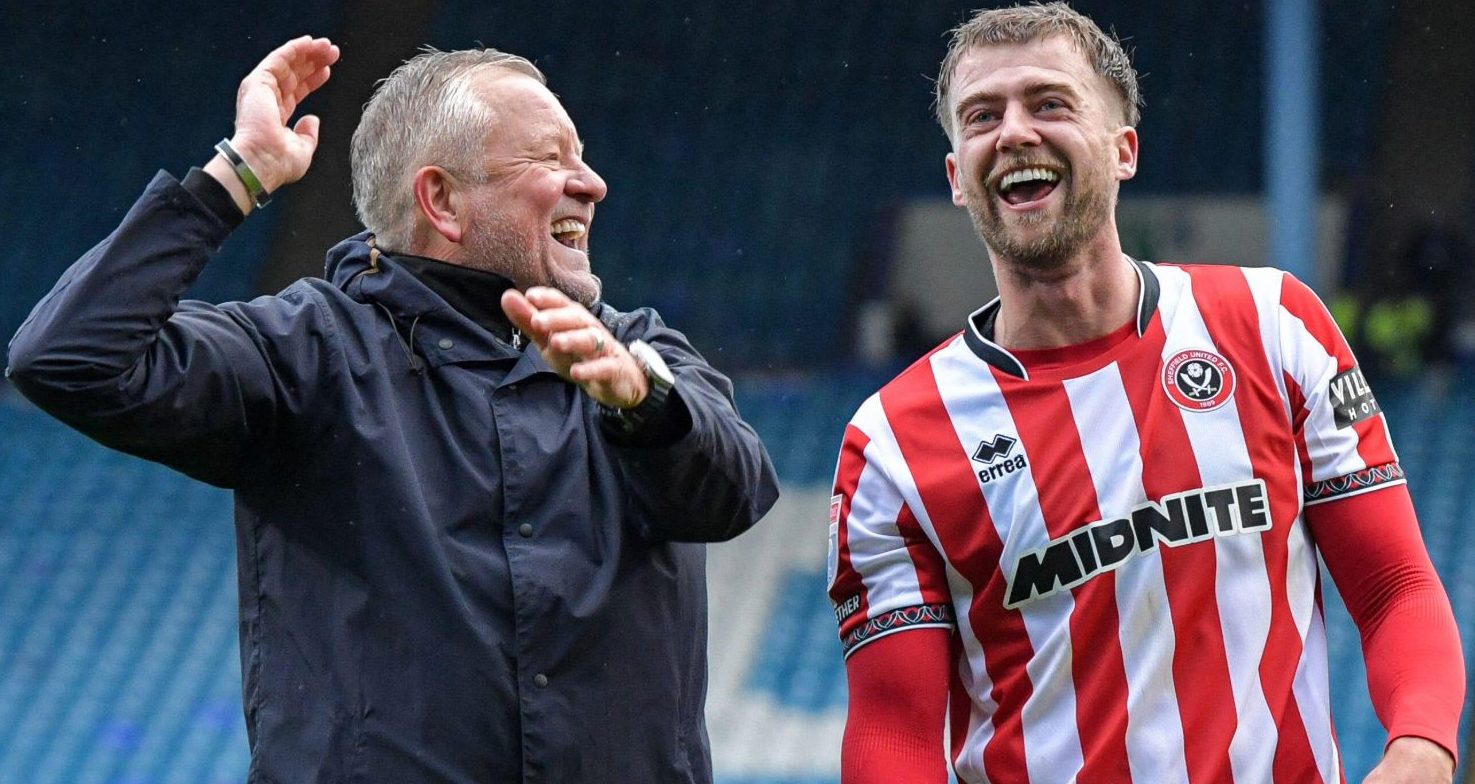 Patrick Bamford and Chris Wilder celebrate Sheffield United’s Steel City derby day victory