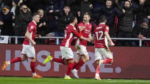 Bristol City’s Rob Atkinson, middle, celebrates scoring their second