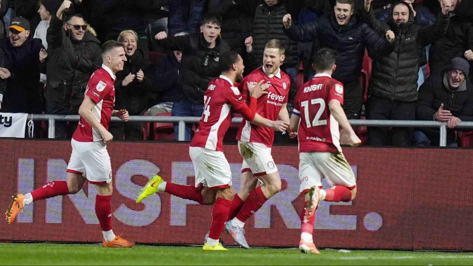 Bristol City’s Rob Atkinson, middle, celebrates scoring their second