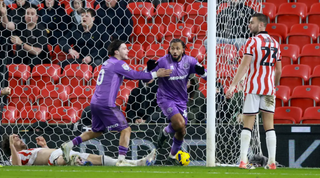 Jairo Riedewald (centre) was on target for Sheffield United at Stoke City
