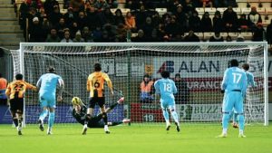 Cambridge United’s keeper Jake Eastwood saves Aaron Pressley’s penalty for Walsall