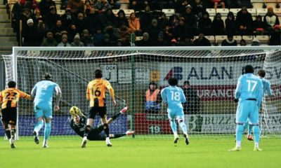 Cambridge United’s keeper Jake Eastwood saves Aaron Pressley’s penalty for Walsall