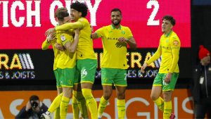 Jovon Makama, centre, celebrates his winner for Norwich City