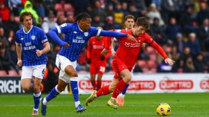 Leyton Orient’s Ollie O’Neill attempts to break away from Cardiff City’s Gabriel Osho