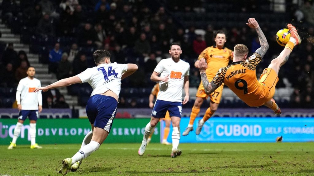 Oli McBurnie, right, scores Hull City&rsquo;s third goal with a bicycle kick
