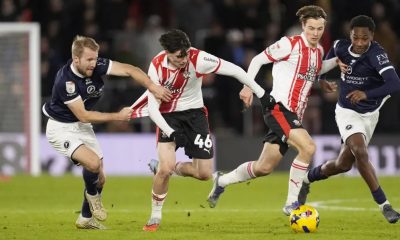 Southampton’s Jay Robinson and Millwall’s Billy Mitchell (left) battle for the ball