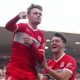 Tommy Conway, left, celebrates with Dael Fry after scoring his second and Middlesbrough’s fourth