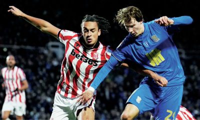 Birmingham City’s August Priske and Stoke City’s Ashley Phillips battle for the ball