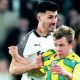 Derby’s Danny Batth and West Brom’s Aune Heggebo do battle