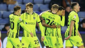 Adrian Segecic, left, celebrates his precious goal