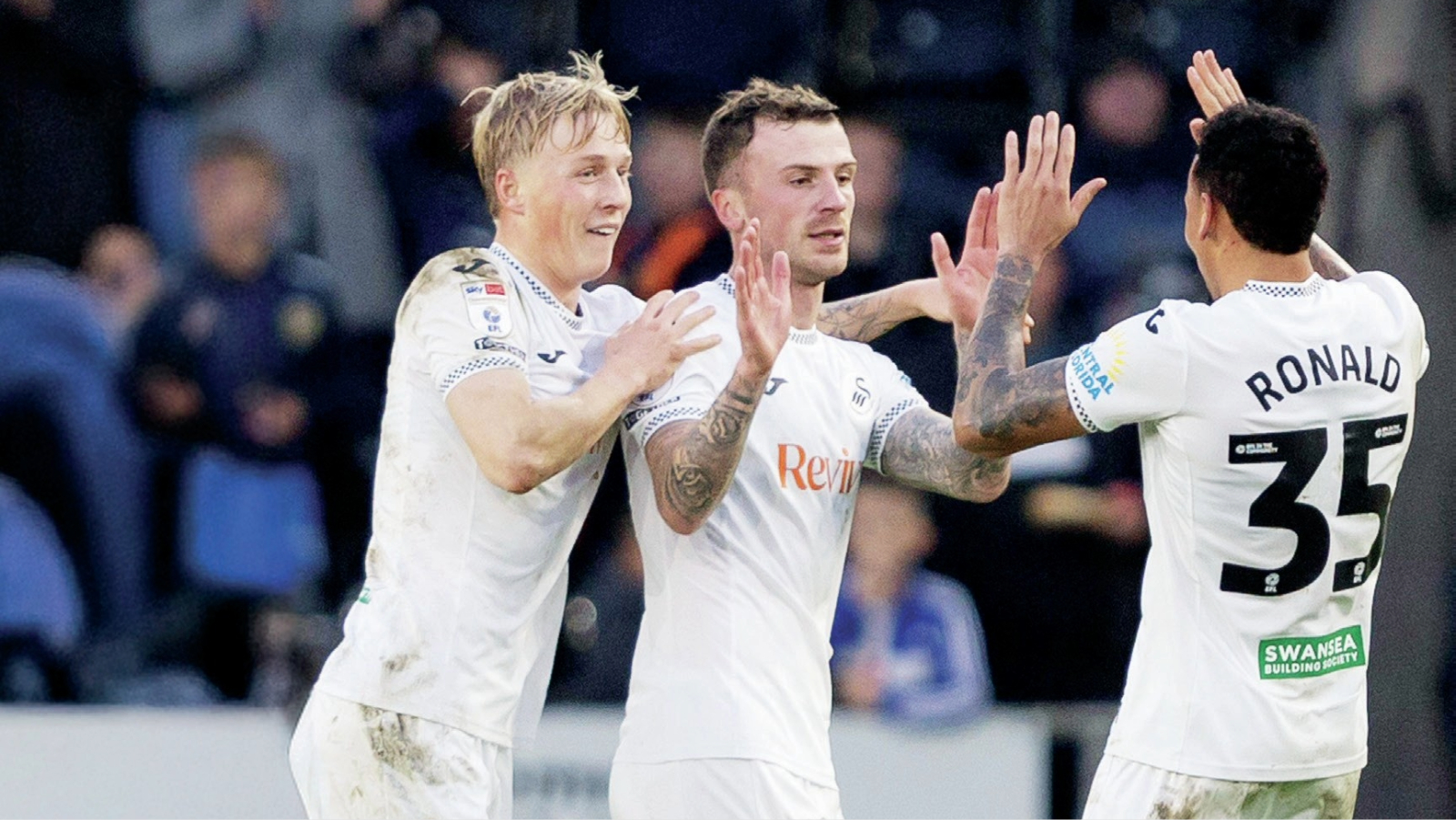 Swansea’s Josh Tymon is congratulated on his wonder goal