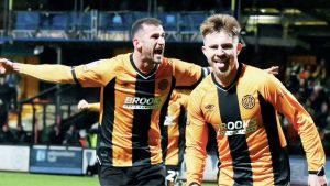 Ben Knight, right, celebrates scoring for Cambridge United