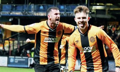 Ben Knight, right, celebrates scoring for Cambridge United