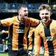 Ben Knight, right, celebrates scoring for Cambridge United