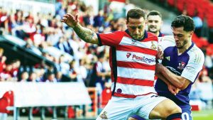 Billy Sharp in action for Doncaster Rovers against Exeter City