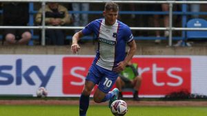Charlie Wyke playing for Carlisle United in League Two before his injury agony