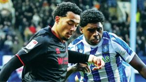 Millwall’s Femi Azeez prepares to cross